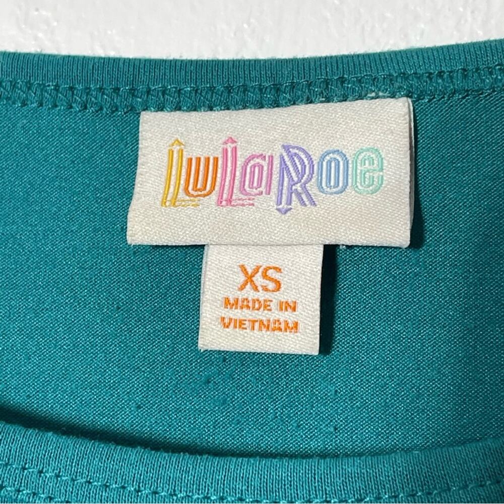 LuLaRoe Irma Tunic Shirt. Size XS. In good used condition! - Picture 5 of 5